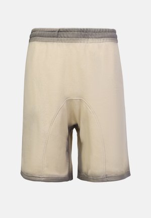 Béžové sportovní šortky s šedým elastickým pasem, které mají hladký povrch a boční švy. Zakřivený design pro zvýšené pohodlí a lepší střih.