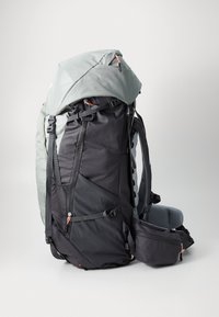 Black and gray hiking backpack with a rigid structure, multiple compartments, adjustable straps, and a top flap for added weather protection.