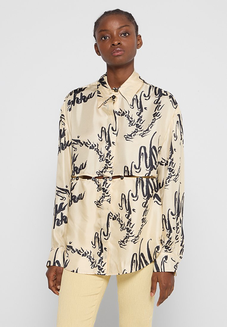 Nanushka Overhemdblouse beige Nanushka Overhemdblouse beige