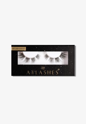 Black rectangular packaging with a transparent window, featuring two pairs of long black eyelashes. Text reads "DIY Lash System" and "AYLASHES."