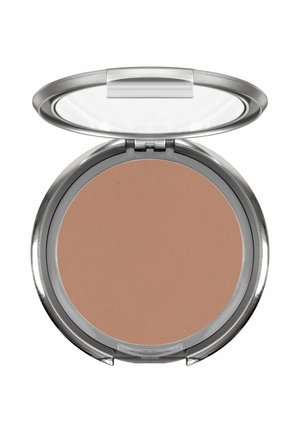 Compact makeup powder in a round silver case with a clear hinged lid, showing smooth beige pressed powder inside.