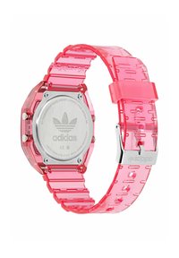 Rožinė skaidri skaitmeninė laikrodžiai su drąsiu dizainu, turinti metalinį nugarėlę su „Adidas“ logotipu ir saugų užsegimą.