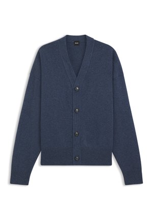 Cardigan blu navy lavorato a maglia con scollo a V, maniche lunghe e sei bottoni neri. Presenta polsini e orlo a coste per una texture più definita.