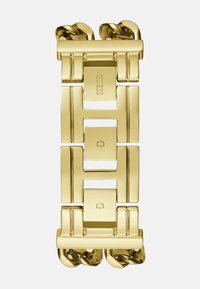 Guldmetalarmbånd med sammenkoblede rektangulære led, præget logo detaljer og en tekstureret kædeaccent i hver ende.