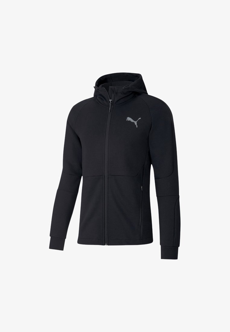 Hoodie zippé noir en tissu texturé, doté d'une capuche, de poches latérales et d'un logo réfléchissant sur la poitrine gauche.