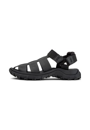 Schwarze Outdoor-Sandalen mit mehreren Riemen, einer strukturierten Sohle, verstellbaren Riemen und einem gepolsterten Fußbett für Komfort.