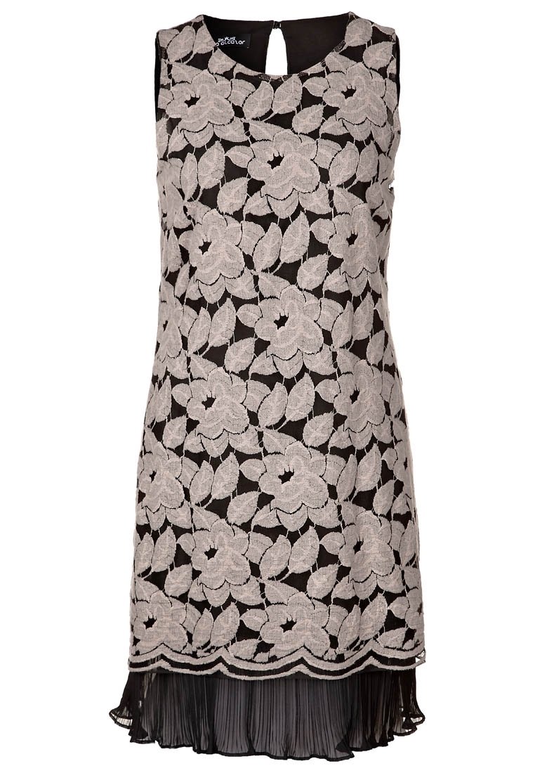 Svart ärmlös klänning med blommig spetsöverdrag, med en vågig fåll och plisserad nederdel. Detalj med nyckelhål i ryggen.