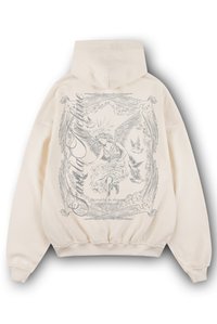 Sweat à capuche couleur crème avec une grande impression graphique grise d'un ange et de colombes dans le dos, avec des poignets et un ourlet côtelés.