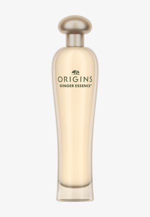 Doorzichtig glazen parfumflesje met een afgeronde, gouden dop. Bevat lichtgeel vloeistof. "ORIGINS GINGER ESSENCE" staat in groen op de voorkant gedrukt.