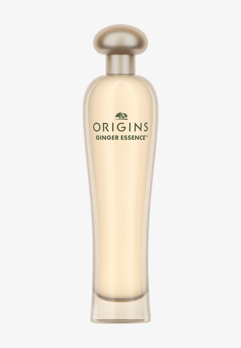 Flacon de parfum en verre transparent avec un bouchon arrondi doré. Contient un liquide jaune clair. "ORIGINS GINGER ESSENCE" imprimé à l'avant en vert.