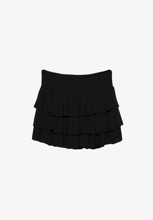 Musta kerroksellinen hame, joka on valmistettu kevyestä kankaasta. Hameessa on kolme vaakasuoraa röyhelöä ja joustava vyötärö, mikä takaa mukavan istuvuuden.