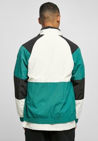 Starter RETRO  - Poletna jakna - palewhite darkfreshgreen black