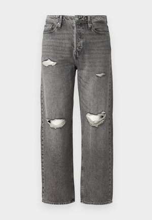 Sive traperice s opuštenim krojem, s izrezima na koljenima, klasičnim dizajnom s pet džepova i zatvaračem na munje.