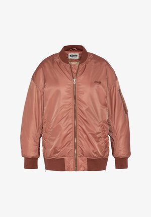 Braune Bomberjacke mit einer glatten, glänzenden Oberfläche, Reißverschluss, gerippten Bündchen und Saum. Olivgrüne, locker sitzende Hose und graue Sneakers.