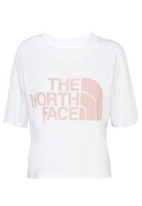 Bílý zkrácený tričko z bavlny s krátkým rukávem. Na přední straně se nachází velký růžový potisk loga "THE NORTH FACE".