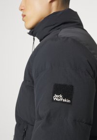 Jack Wolfskin DELLBRUECK - Dunjacka - granite black