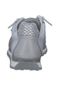 Gray athletic shoe featuring a textured, metallic heel, soft suede material, and a patterned overlay with a rubber outsole and laces.