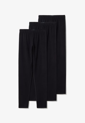 Trois paires de leggings noirs avec des tailles élastiques, posées à plat et empilées avec la plus petite paire devant.