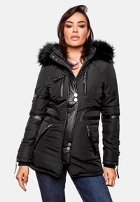 Black insulated jacket with faux fur hood, featuring a zip front, multiple zippered pockets, and leather accents. Padded, tailored fit.