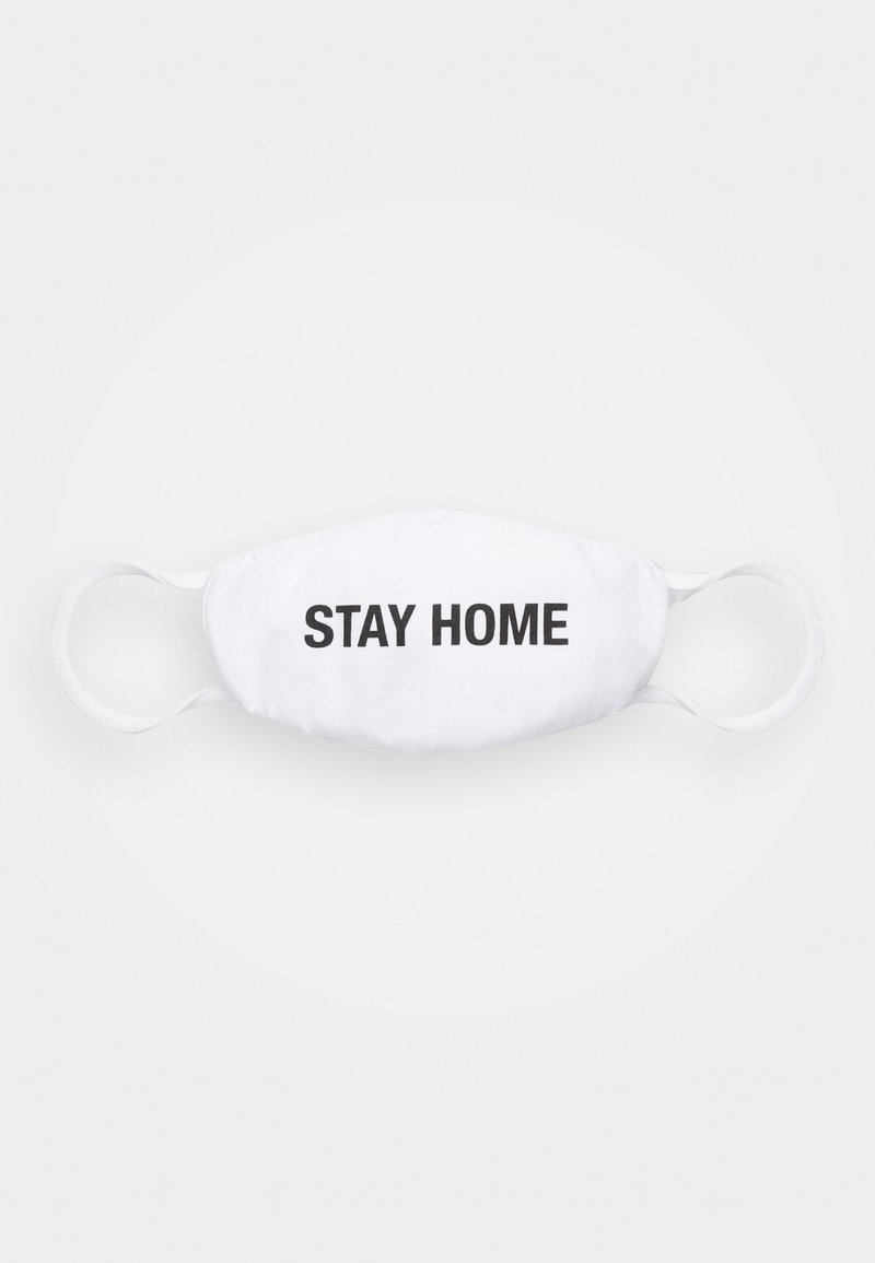White fabric face mask with elastic ear loops, featuring the text "STAY HOME" in bold black letters across the front.