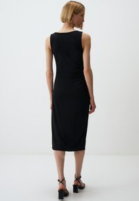 Jimmy Key SLEEVELESS BASIC MIDI - Robe en jersey - black