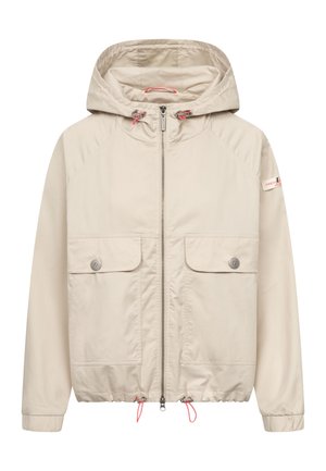 Beige gewatteerde jas met capuchon, voorrits, twee klepzakken met knopen, verstelbare trekkoorden aan capuchon en zoom, en elastische manchetten.