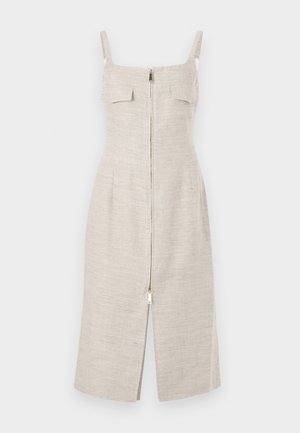 Beige linnedress med en tætsiddende silhuet, justerbare skulderstropper, to forlommer og en central lynlås fra halsudskæringen til kanten.