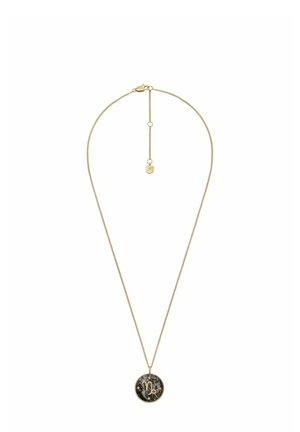 Collier en métal doré avec une chaîne délicate, présentant un pendentif circulaire avec un centre noir et la lettre "C" en or.