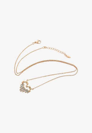 Delicate gouden ketting met een geometrische hartvormige hanger versierd met kleine heldere edelstenen.