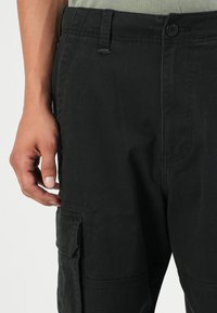 Hollister Co. SKATER BAGGY - Kareiviško stiliaus kelnės - black
