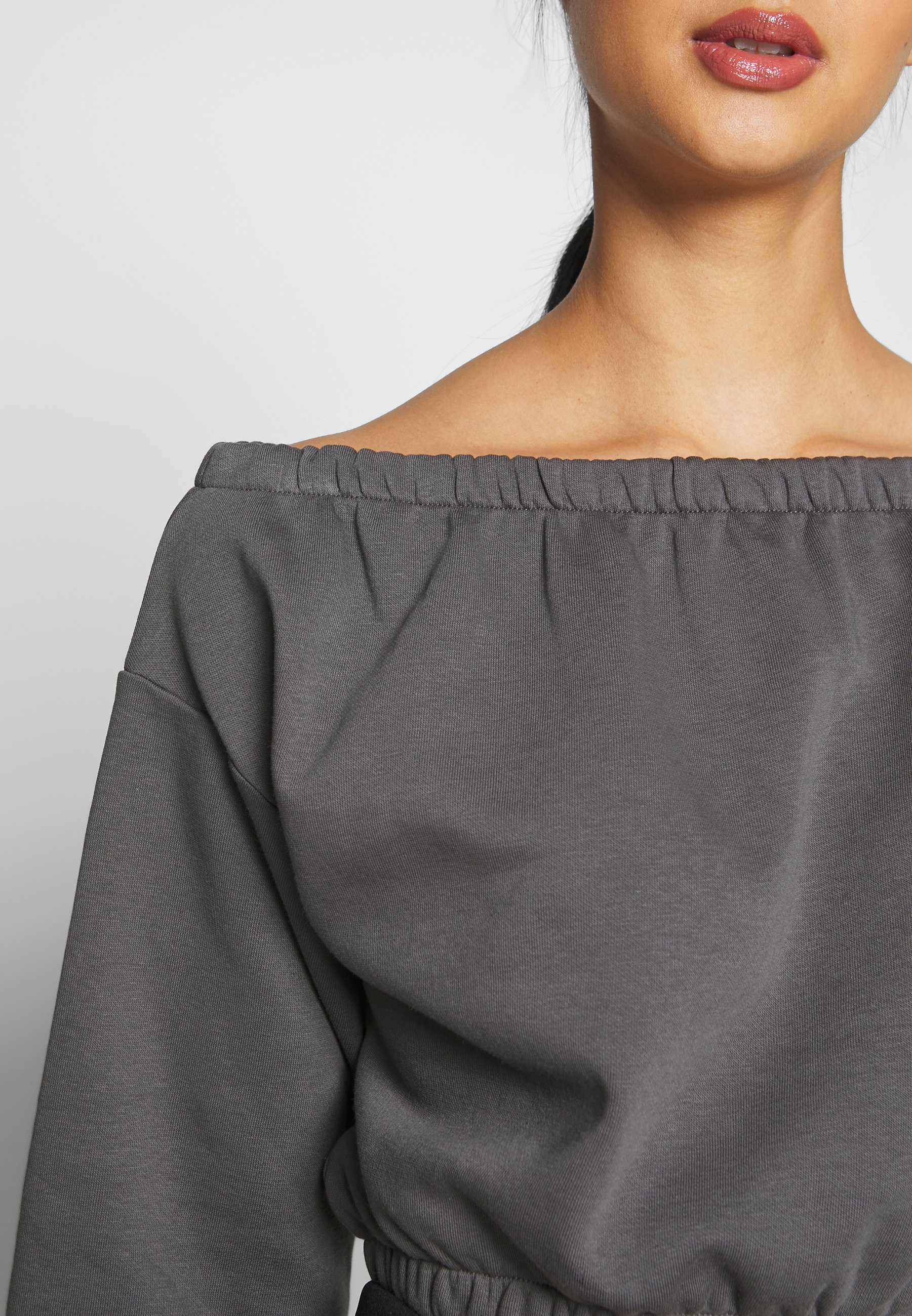 sweatshirt off shoulder