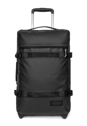 Borsa da viaggio nera con ruote, realizzata in tessuto resistente, dotata di cinghie regolabili, manico superiore e manico estraibile. Presenta una toppa con logo.