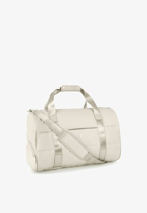 Borsa da viaggio imbottita beige chiaro con doppie maniglie, tracolla regolabile, tasca laterale con cerniera e tasca frontale con patta con logo discreto.