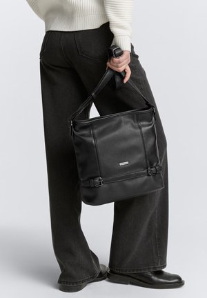 TTJUNA - Cross body bag - black