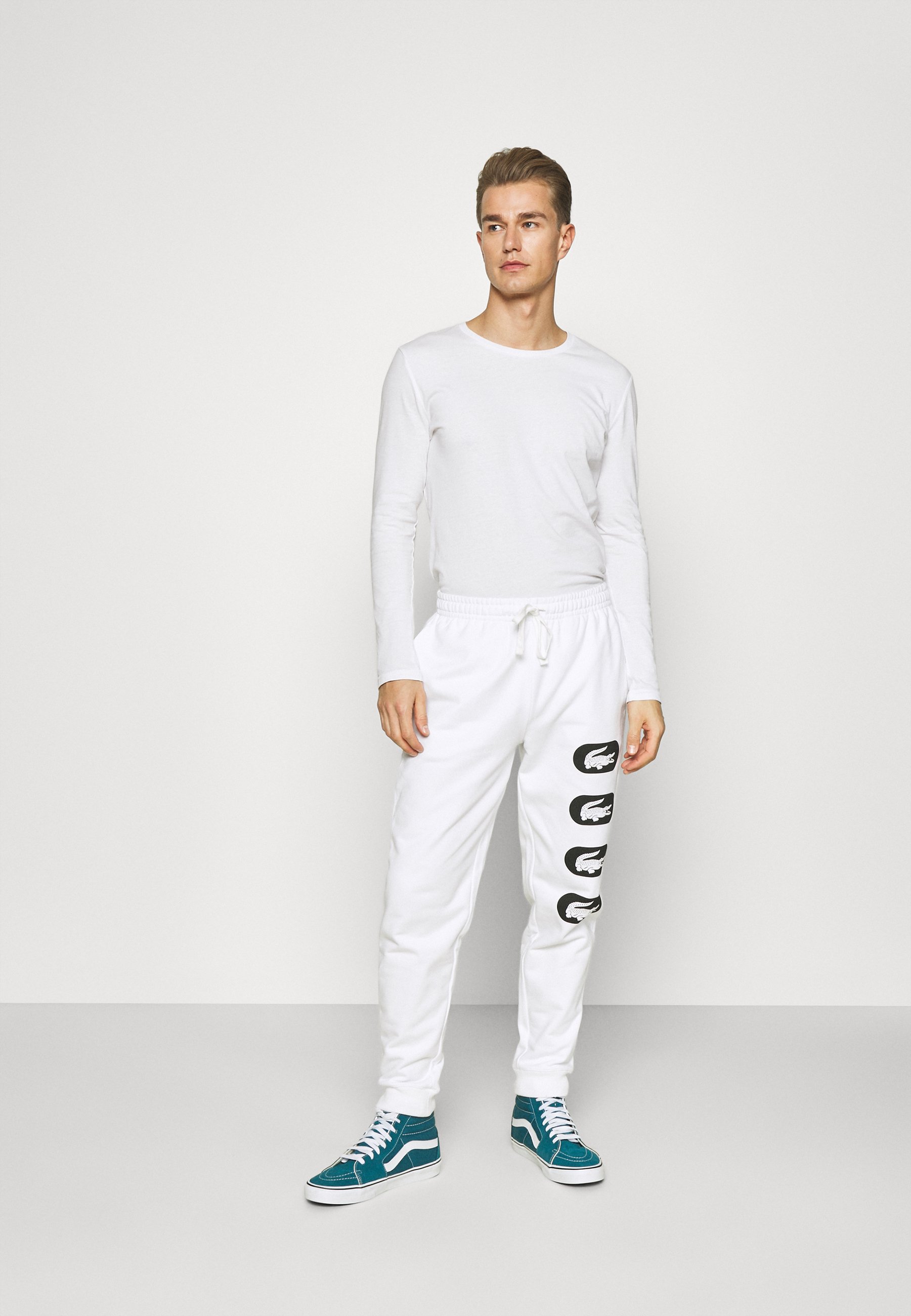 Lacoste Pantaloni sportivi - white/bianco - Zalando.it