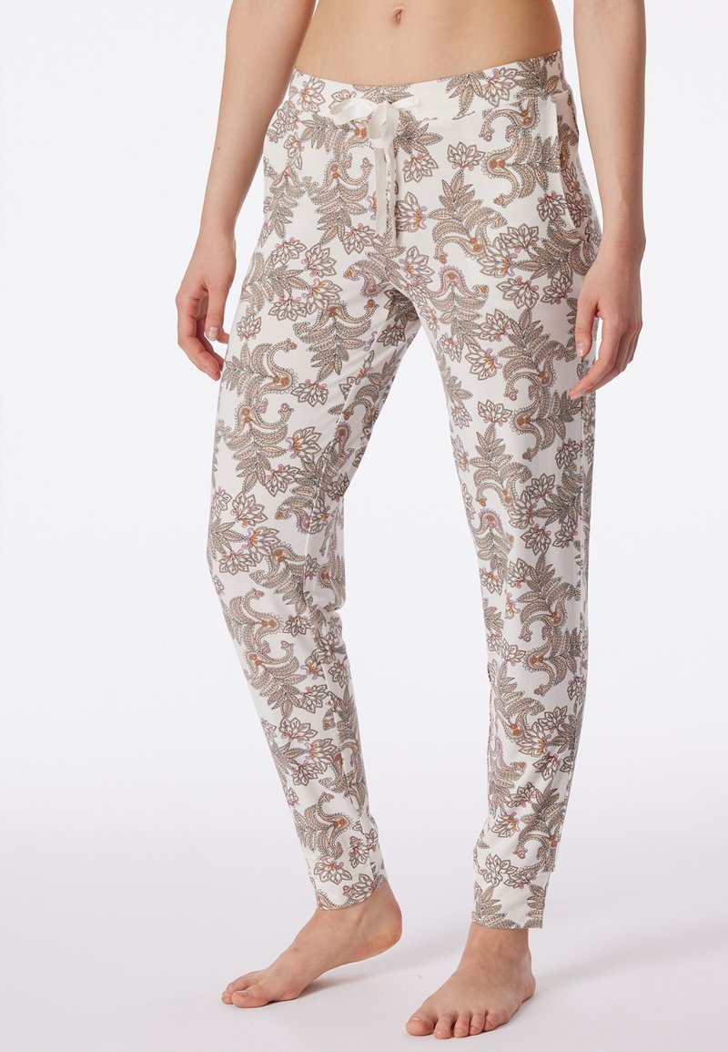 Pantaloni lounge bianchi con stampa paisley in marrone e rosa. Presentano una vita con coulisse e una vestibilità slim. Tessuto morbido e leggero.