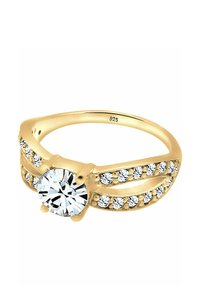 Gold ring featuring a large round clear stone at the center, surrounded by smaller clear stones along the band, marked "925" for silver content.