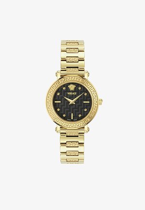 Versace kullatooni kell, millel on must sissevõetud dials, silmapaistev logo, kuldsed aksessuaarid ja dekoratiivne rihm, millel on Kreeka võtmemotiiv.