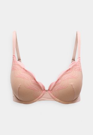 Beżowy biustonosz z fakturowanej tkaniny z jasnoróżową falistą koronkową lamówką. Posiada fiszbiny i regulowane ramiączka.