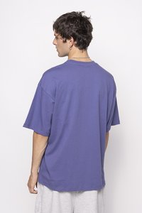 Purple cotton t-shirt with a relaxed fit, short sleeves, and crew neckline. Displays minimal seams and a smooth texture.