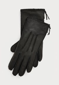 Selected, black pebble