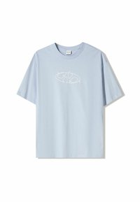 Light blue cotton t-shirt with short sleeves and a round neckline. Features a white graphic design on the front with abstract shapes.