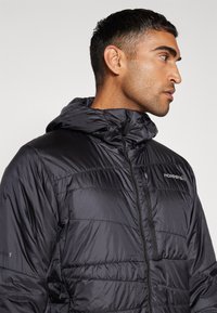 Norrøna FALKETIND THERMO40 HOOD - Vinterjakke - caviar