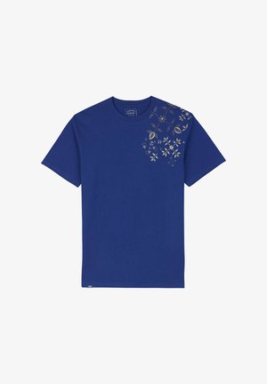 T-shirt en coton bleu ornée d'imprimés floraux et de feuilles dorés en haut à gauche, à manches courtes et avec un col rond.