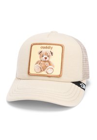 Gorra de béisbol beige con un parche de oso texturizado, que presenta el texto "esponjoso" y una parte trasera de malla para ventilación. Incluye un visor curvado y una correa ajustable.