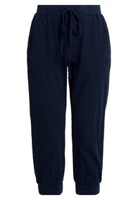 Marineblauwe joggerbroek van een zachte, gestructureerde stof. Voorzien van een elastische tailleband met een trekkoord en taps toelopende boorden bij de enkels.
