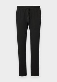 Black jogger pants with an elastic waistband and drawstring. Made from soft fabric, featuring a tapered leg design and minimal details.