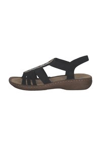 Svart sandal med flera tygremmar, elastisk ryggrem, vadderad fotbädd och texturerad brun gummisul. Pärlade detaljer på ovandelen.