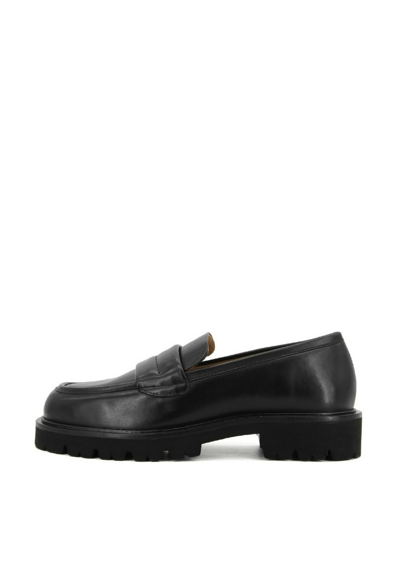 Black leather loafer with a rounded toe, flat rubber sole, and decorative strap detail on the upper. Sleek finish with minimalist design.