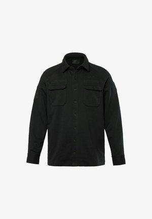Schwarzes Langarmshirt mit Knopfverschluss, zwei Brusttaschen und gestickten Details am Kragen und den Ärmeln. Weicher Stoff.